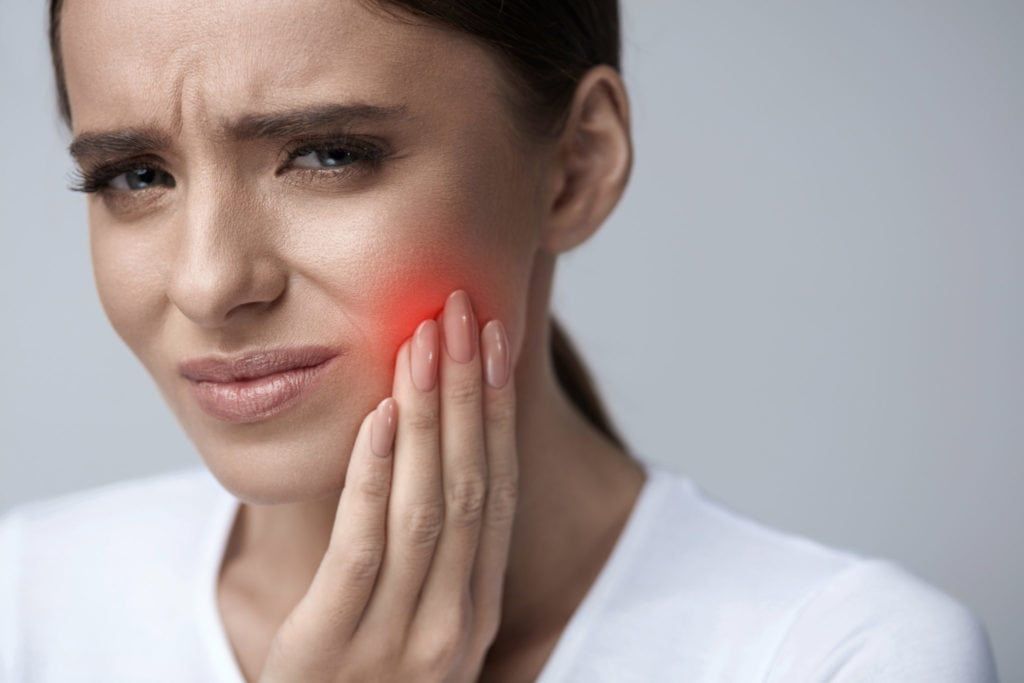 Woman Feeling Tooth Pain.