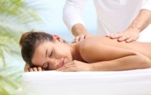 Woman laying down receiving a massage