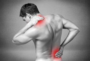 Man experiencing necl and lower back pain from Polymyositis
